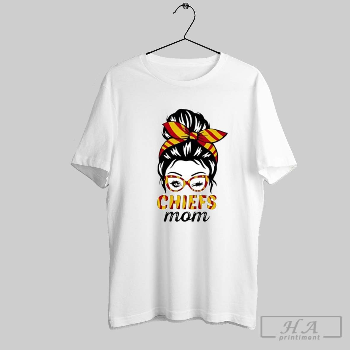 Official Chiefs Mom Winking Eye Messy Bun Leopard - Adult & Kids T-Shirts, Sweatshirts & Hoodies apparel design preview 1